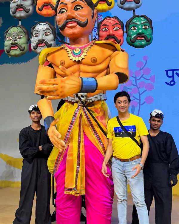 Posing with the 12-foot Ravan puppet my team and I created for the Paani Foundation's Farmer Cup. This puppet, with its ten heads representing ten farming issues, was the centerpiece of a powerful dance drama.