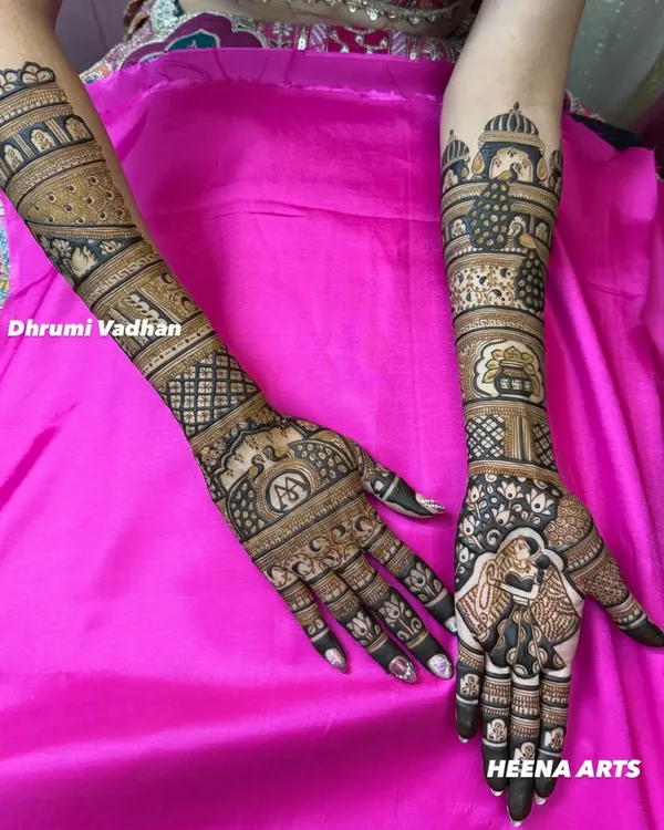 A complete bridal mehendi look, featuring a couple portrait, initials, and traditional Rajasthani architectural motifs.