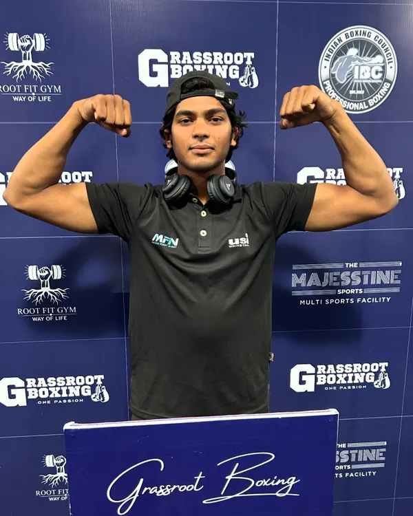 This is me, Kapil, at a professional boxing event. As an active fighter, I bring the latest techniques and a real fighter's mindset to my coaching, ensuring you get the most effective training possible.