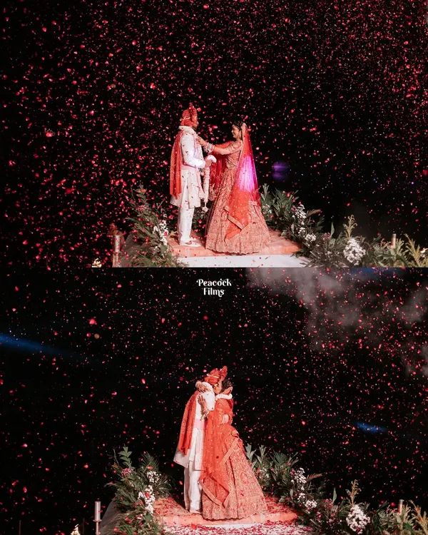 A universe of love explodes in a shower of crimson petals. This is the kind of grand, cinematic moment I live to capture, where two people are the only two in the world.