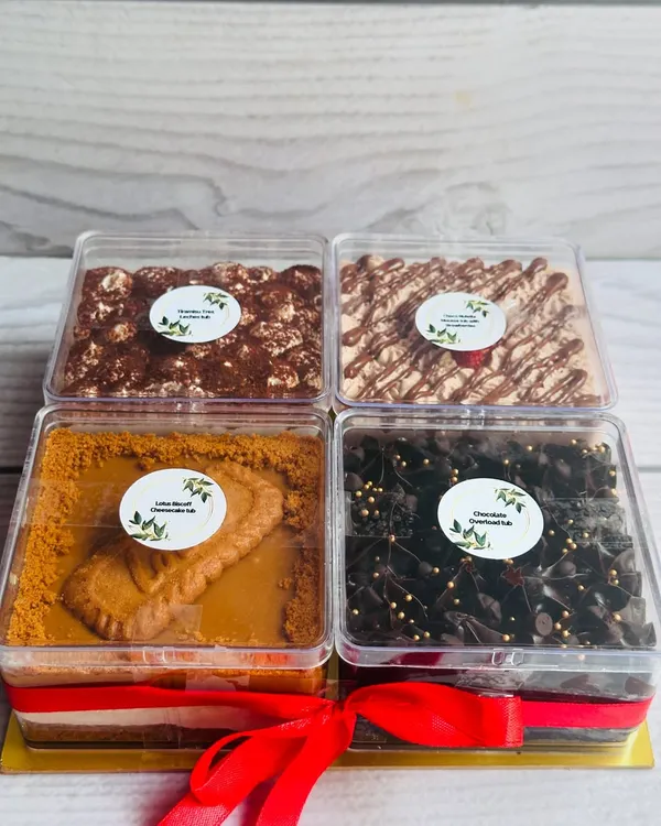 My assorted dessert tub gift box is the perfect gift for any occasion. This set includes four of my most popular flavors: Lotus Biscoff Cheesecake, Tiramisu Tres Leches, Chocolate Overload, and Choco Nutella Mousse with Strawberries.