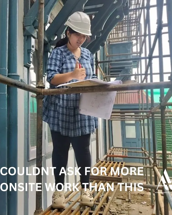 An intern getting valuable hands-on experience, reviewing plans on the scaffolding of a live construction site. I believe in providing immersive learning opportunities.