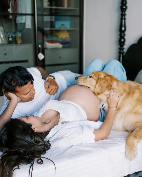 This is what it's all about for me. A relaxed moment at home, the whole family together, including your first baby, the furry one. I focus on capturing these genuine connections that show the love your new baby is coming into.