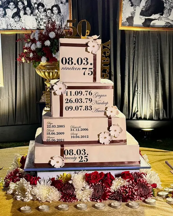 This 20kg, four-tier anniversary cake was a true labor of love, designed to celebrate 50 years of a beautiful family story. Each tier represents a generation, with important dates stenciled to mark their journey.