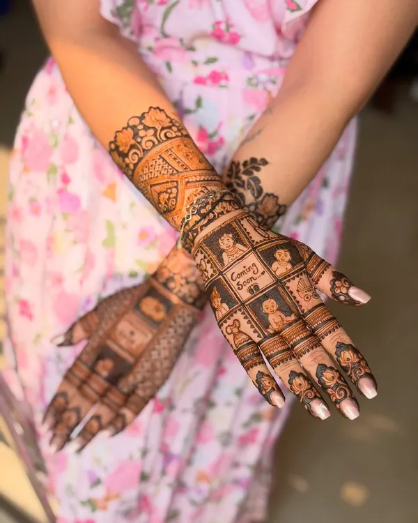 A perfect example of a baby shower mehendi, with a grid of adorable baby-related motifs and a "Coming Soon" announcement.