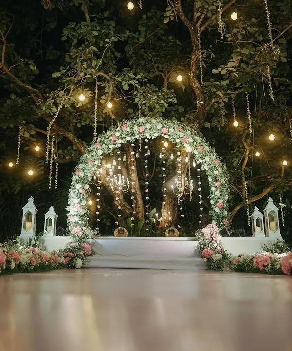 A fairytale setting for a magical night. We capture the beauty of your wedding decor, like this enchanting floral arch at Royalton Leisure, to preserve the ambiance of your celebration.