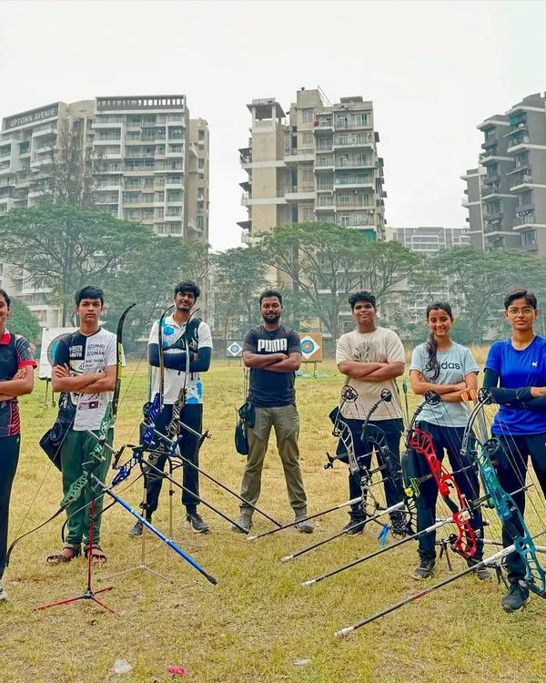 A group photo of our Drona archers at the training ground. This mix of recurve and compound archers represents the diverse and dedicated community we've built.
