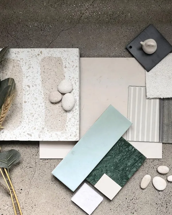 This is the material palette we developed for the 'Crème' wellness project. We curated a selection of terrazzo, marble, textured tiles, and soft fabrics in a soothing, earthy color scheme to establish the project's core aesthetic of soft, blended surfaces.