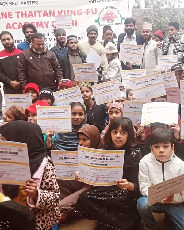 A proud moment for the whole academy. My students, both boys and girls, hold up their certificates after a successful event. Their hard work paid off.