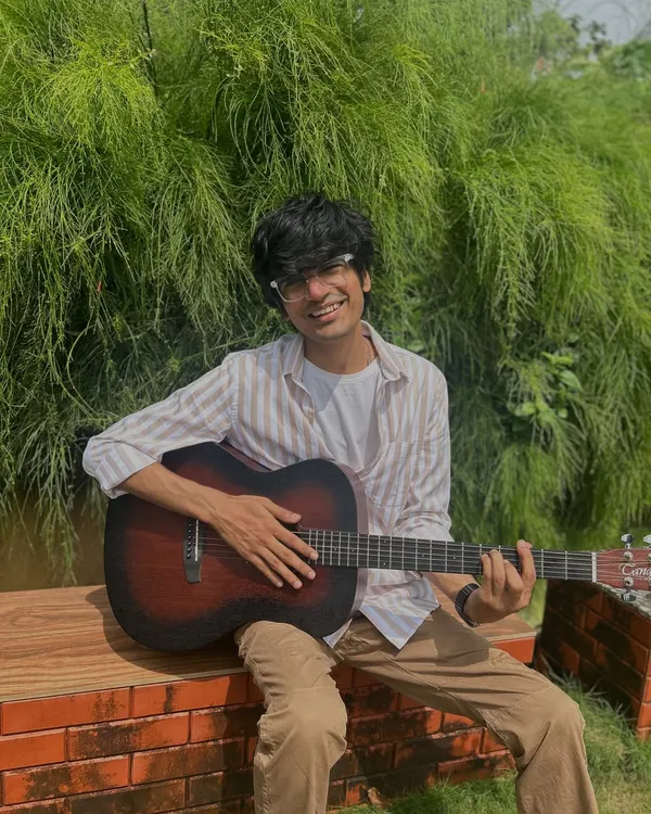 Just me, my guitar, and some nice green vibes. This is when I feel most at peace, creating music surrounded by nature.