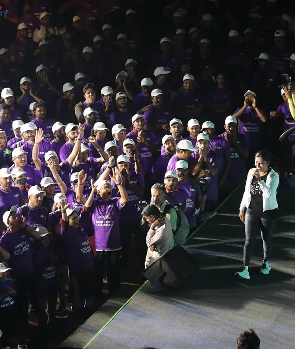 Interacting directly with the crowd from the stage at the Safe-A-Thon. My approach to hosting is all about real engagement, not just talking at people.