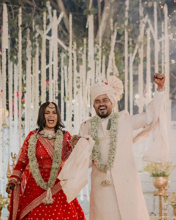 A moment of pure celebration after the ceremony. I love capturing the unscripted joy and energy of a couple as they begin their new life together.