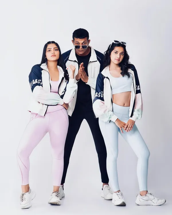 A fun group shot for an athleisure brand, inspired by 90s Bollywood. This kind of creative direction helps a brand build a unique and memorable identity.