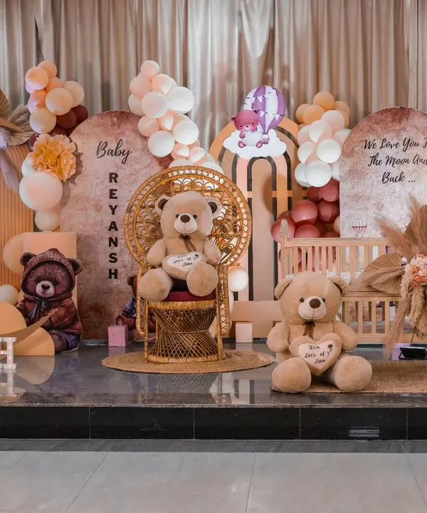 A "We Love You to the Moon and Back" teddy bear theme for a baby's rice ceremony. I can adapt this popular and heartwarming theme for various traditional functions, blending modern aesthetics with cultural celebrations.