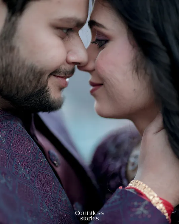 This is the essence of intimacy. A tight close-up where the world fades away and all that matters is the quiet connection between two people. These are the portraits that speak without words, capturing the deep affection in a simple, gentle touch.