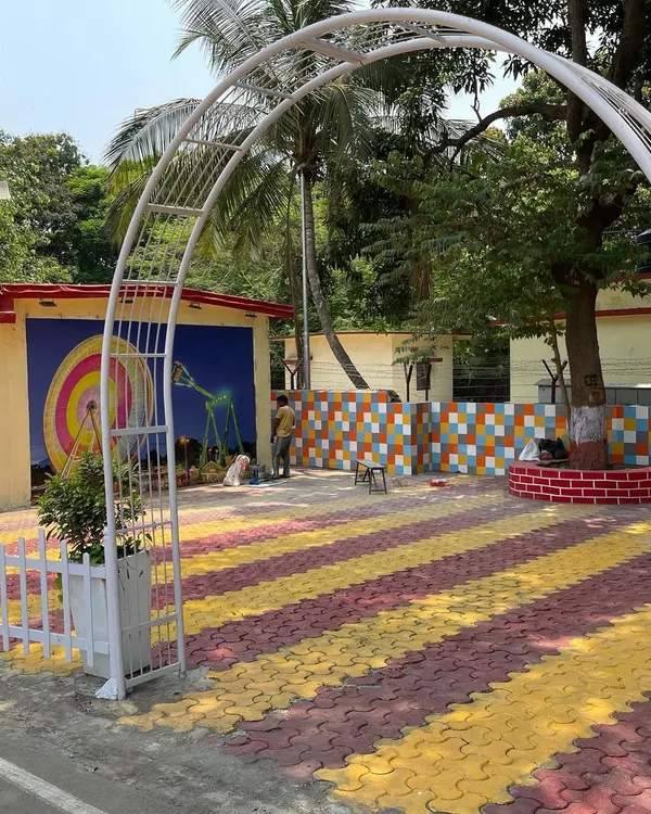 A view of our landscape transformation at INS Tanaji, the Indian Naval Station in Mankhurd. We introduced colorful paving, murals, and new plantings to create a bright and cheerful recreational area for the naval staff.