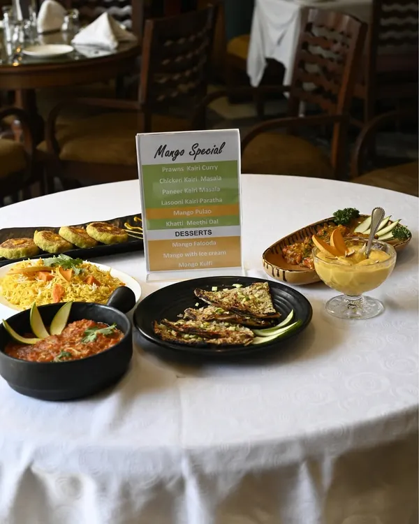 Our Mango Festival is a celebration of summer's favorite fruit. We present a full spread where mango is the star, featured in everything from savory starters and main courses to decadent desserts.