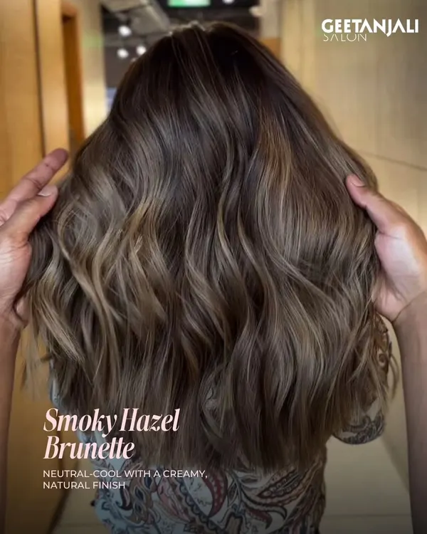 This Smoky Hazel Brunette is perfect for those wanting a neutral, cool-toned look. The creamy, natural finish is achieved through a meticulous balayage technique that blends shades seamlessly.