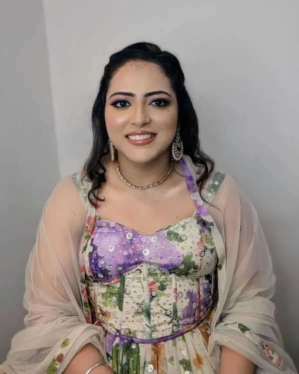 A fresh and floral-inspired look for her engagement day. I focused on creating a flawless, glowing base with soft pink tones on the eyes and lips to complement her beautiful corset-style gown.