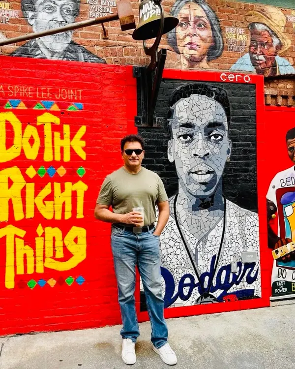 In Brooklyn, New York, standing in front of a mural that says "Do The Right Thing." It's a simple message but a powerful guiding principle for both life and the practice of law.