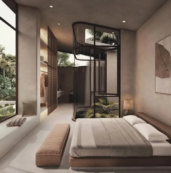 The bedroom in the House of Veils continues the language of soft, secret spaces. An internal courtyard is enclosed in glass next to the bed, bringing nature and light deep into the private quarters of the home.