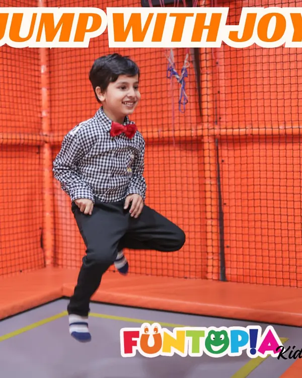 This is what pure joy looks like! Our dedicated trampoline park is the perfect place for kids to burn off energy, bounce high, and even practice their basketball dunks in a safe, fully netted environment.