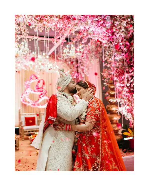 The moment the world fades away. I live for these explosions of joy, like this varmala ceremony, where a shower of flowers marks the beginning of a lifetime of laughter and love. It's pure, unscripted magic.