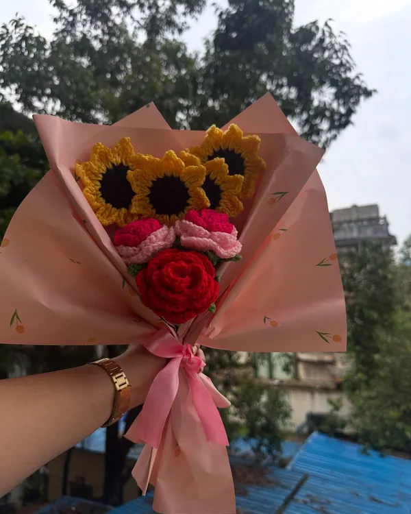 This handmade crochet bouquet combines bright sunflowers and lovely roses, all wrapped up and ready to gift. It's a perfect example of my forever flowers, a beautiful arrangement that brings color and joy to any space without ever wilting.