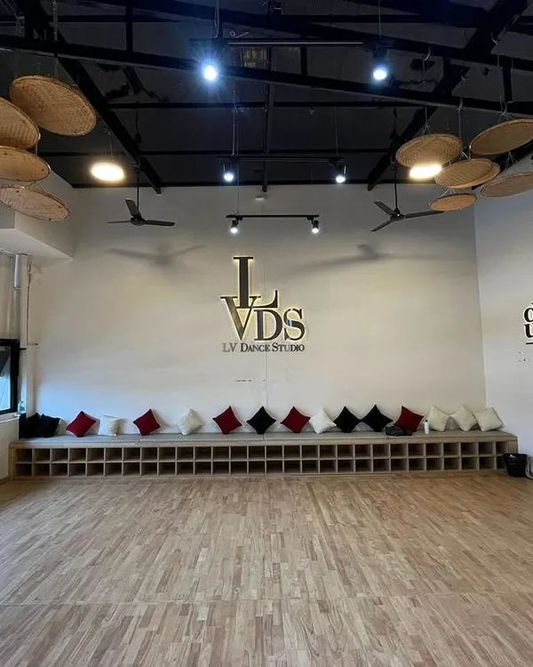 Welcome to our creative space. Our studio is designed for comfort and performance, featuring suspended wooden floors, professional sound systems, and a great atmosphere to learn and rehearse for your big day.