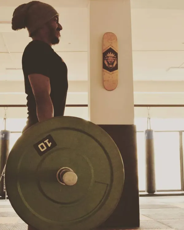 If you think lifting is dangerous, try being weak. Here I am setting up for a deadlift. This is one of the best exercises for building overall strength, which is crucial for any MMA fighter.