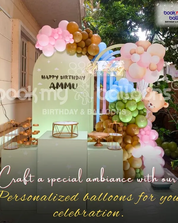 This personalized balloon setup for Ammu's birthday showcases a beautiful pastel organic garland. It demonstrates how we can craft a special ambiance for any celebration, big or small.