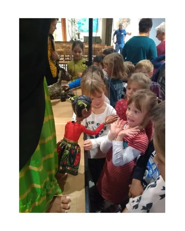Children in Austria getting to meet one of our Indian puppets up close. The curiosity and excitement are universal.