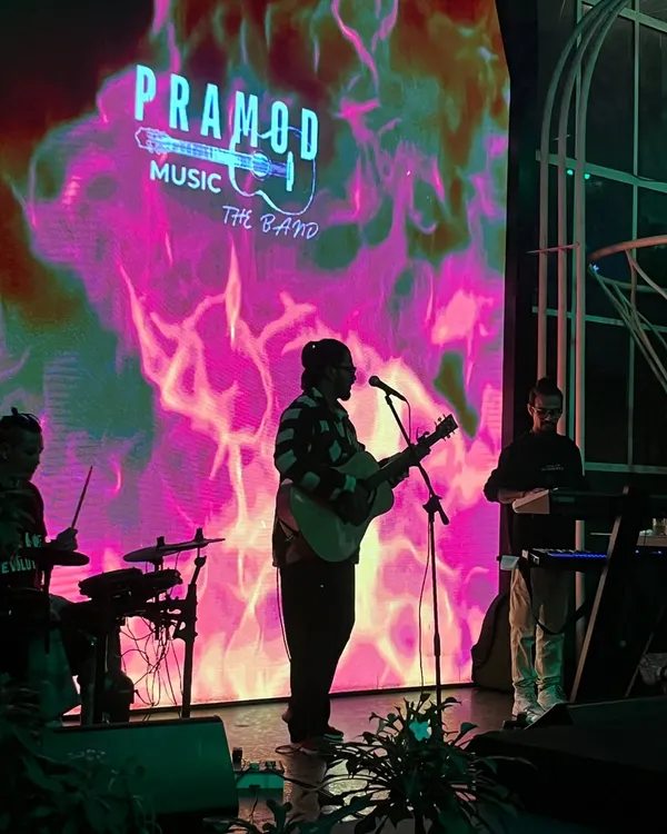 This is what my full band setup looks like when we're ready to bring the house down. With a dynamic LED backdrop and a stage full of energy, we turn corporate galas and award nights into unforgettable concerts.