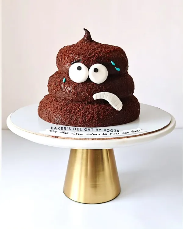 This was not my usual design, but I couldn't say no to creating this cute poop emoji cake. It was a hilarious and memorable cake for a fun-loving client. Would you dare to order one?