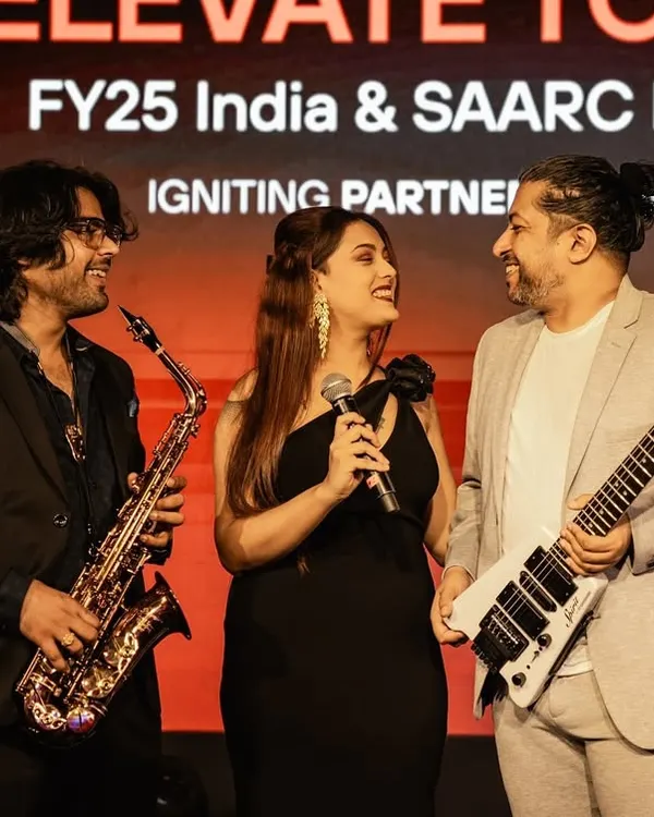 Sharing a laugh on stage with my bandmates at the PaloAlto FY25 India & SAARC Partner Summit. A professional performance doesn't mean we can't have fun.