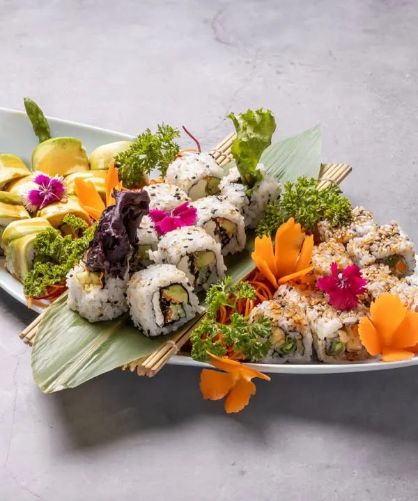 Our Veg Sushi Roll Moriawase Platter is a vibrant medley of our finest vegetarian sushi. It features a variety of rolls, including asparagus tempura, avocado, and cucumber, all beautifully arranged and full of flavor.