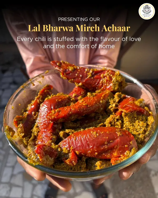 This is where it all began. My Lal Bharwa Mirch Achaar is more than a pickle; it's a story of a mother's love, packed in a jar to feel like home, no matter where you are. Each chili is hand-stuffed with spices and care, just for you.