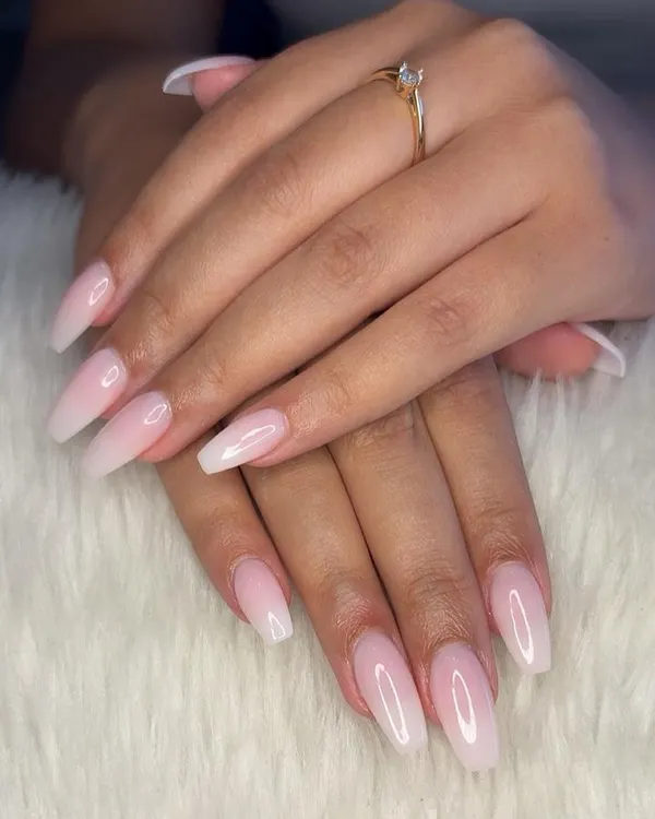 An absolute classic, the milky white ombré or "baby boomer" nail. This set on long coffin-shaped extensions is timeless, elegant, and goes with everything.