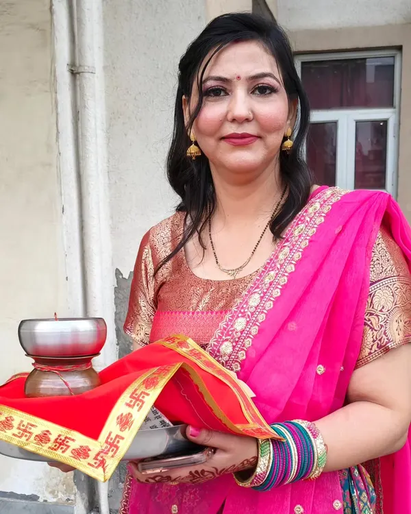 A glimpse of a Karwa Chauth makeup look. She looks absolutely radiant and happy, ready for her celebrations.