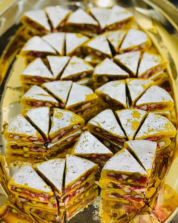 A sweet welcome for your guests. This Dryfruit Sandwich is a rich, layered mithai that looks as incredible as it tastes, perfect for starting any celebration on a sweet note.