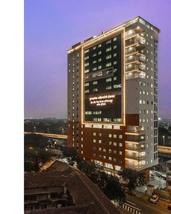 The 20-story Punyashlok Ahilyadevi Holkar Head & Neck Cancer Institute stands as a beacon of hope in a dense urban environment. The facade is designed to be a landmark of specialized care, merging advanced medical facilities with a patient-centric approach.