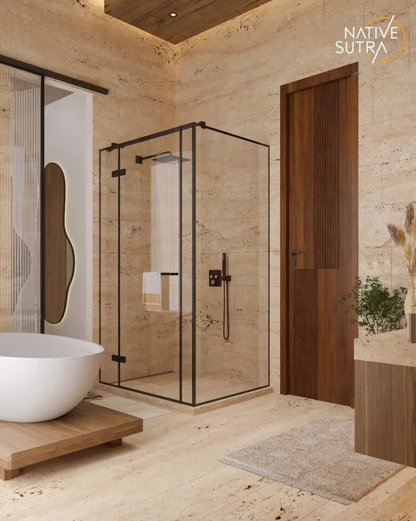 Where calm meets craftsmanship. This bathroom features a freestanding tub on a wooden platform, a glass-enclosed shower, and warm travertine tiles, creating a space where minimalism feels rich and nature walks right in.