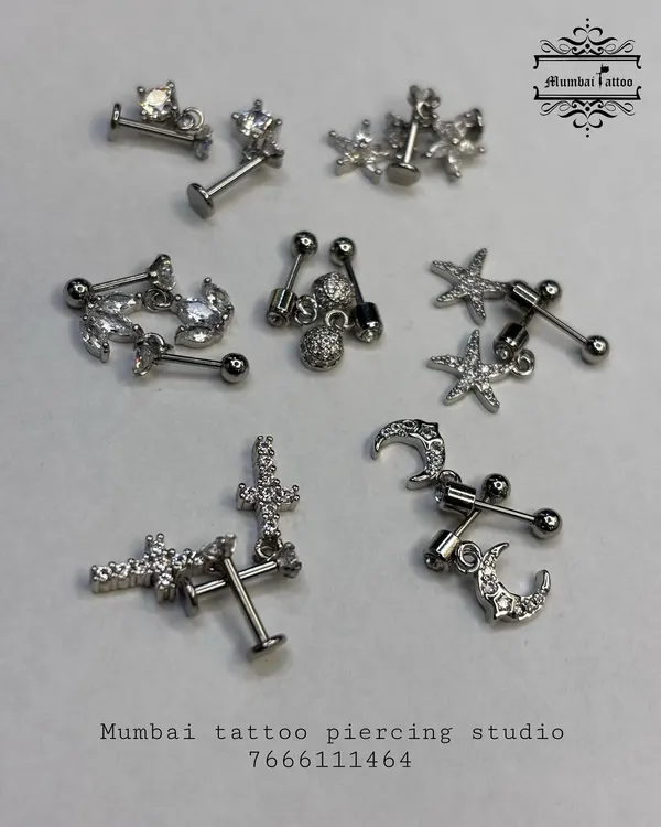 We've restocked our collection of aesthetic studs. These pieces are made from high-quality surgical steel and are perfect for cartilage and lobe piercings.