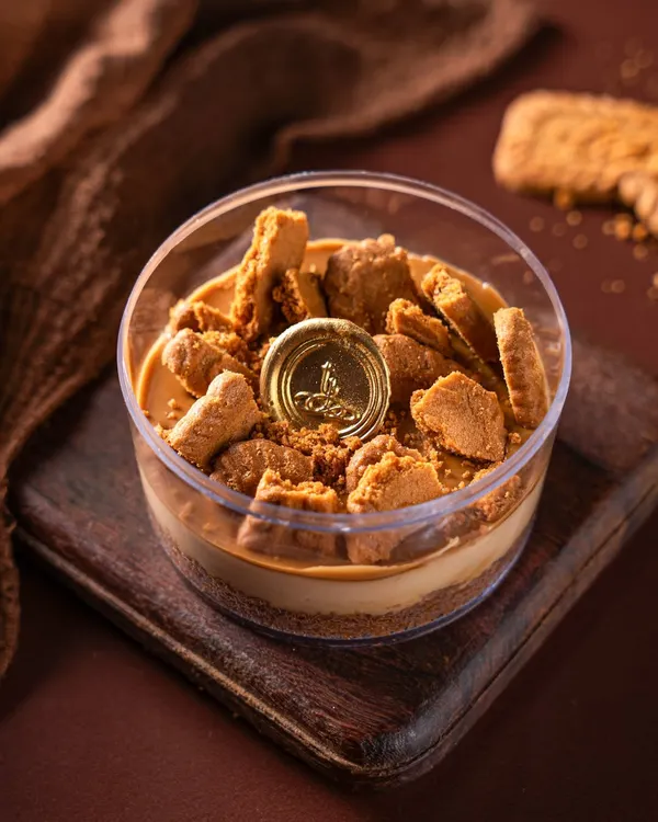 My Biscoff Cheesecake combines a creamy cheesecake filling with a crunchy, spiced biscuit base and topping. It's a delightful mix of textures in every spoonful.
