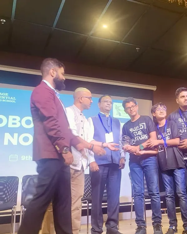Our team on stage receiving the "Best Hardware Solution" award at the RoboCup Junior North competition. This moment recognizes their excellent engineering and design skills.
