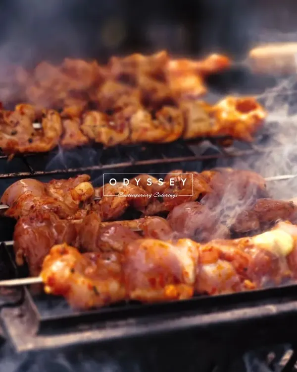 The irresistible aroma of a live barbecue station. Our chefs grill skewers to perfection right before your eyes, adding a sizzling and interactive element to your New Year's party or any outdoor gathering.
