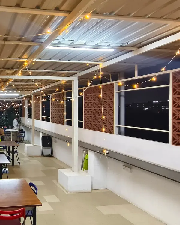 This is the rooftop cafeteria of Bizom, a software company on Sarjapur Road, which we decorated for Christmas. We used strings of warm fairy lights to create a cozy and festive ambiance for their employees to enjoy during the holiday season.