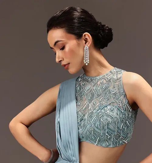 A beautiful soft glam look for a Kalki Fashion campaign. The clean, low bun and defined eyes create an elegant style perfect for a bridesmaid or a cocktail party.