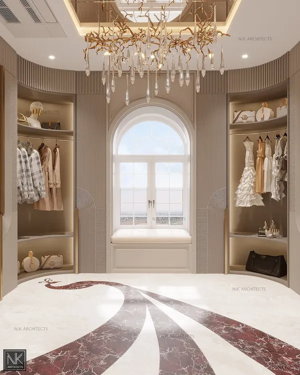 Step into luxury with this stunning dressing room. The design features a beautiful bay window with a seating nook, open closets for easy access, and an exquisite peacock inlay on the floor that flows through the space.