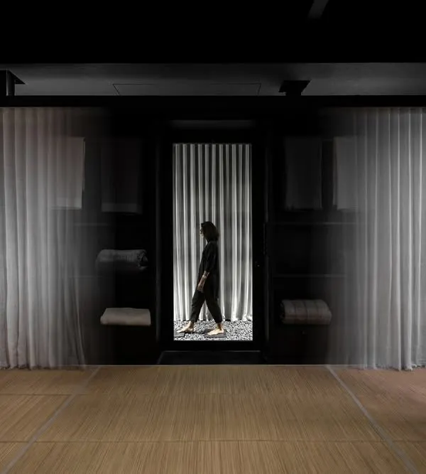 Our design for the Bonnie & Saks flagship store begins with an atmospheric entry. We use dramatic, sheer curtains and a monochromatic palette to create a sense of mystery and transition, inviting visitors to leave the everyday behind and enter a more contemplative retail environment.